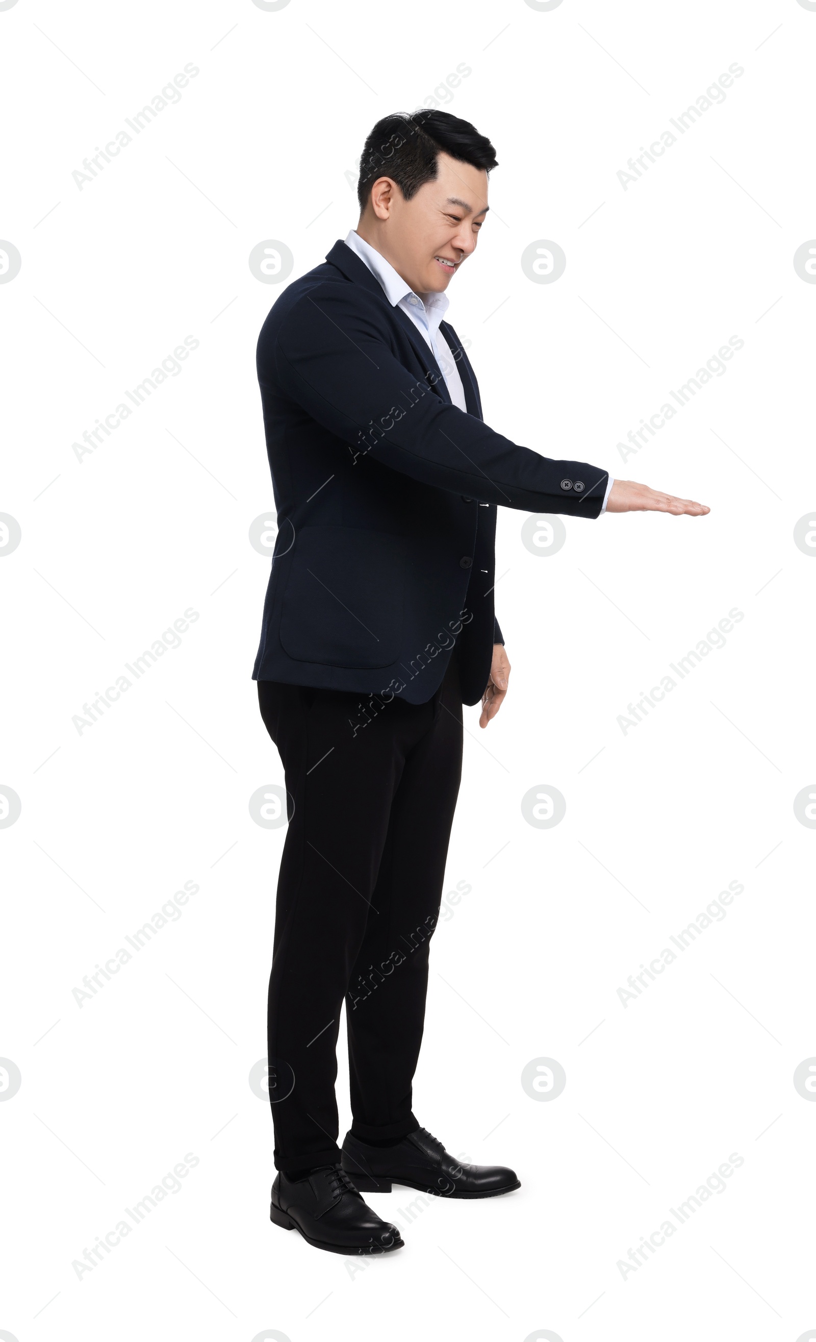 Photo of Businessman in suit posing on white background