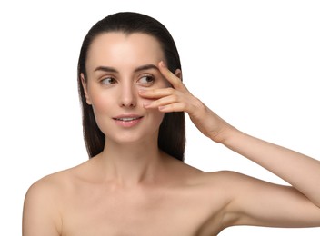 Portrait of beautiful young woman on white background