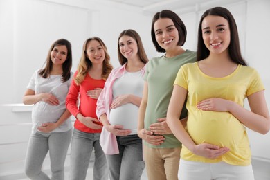 Photo of Grouppregnant women at courses for expectant mothers indoors