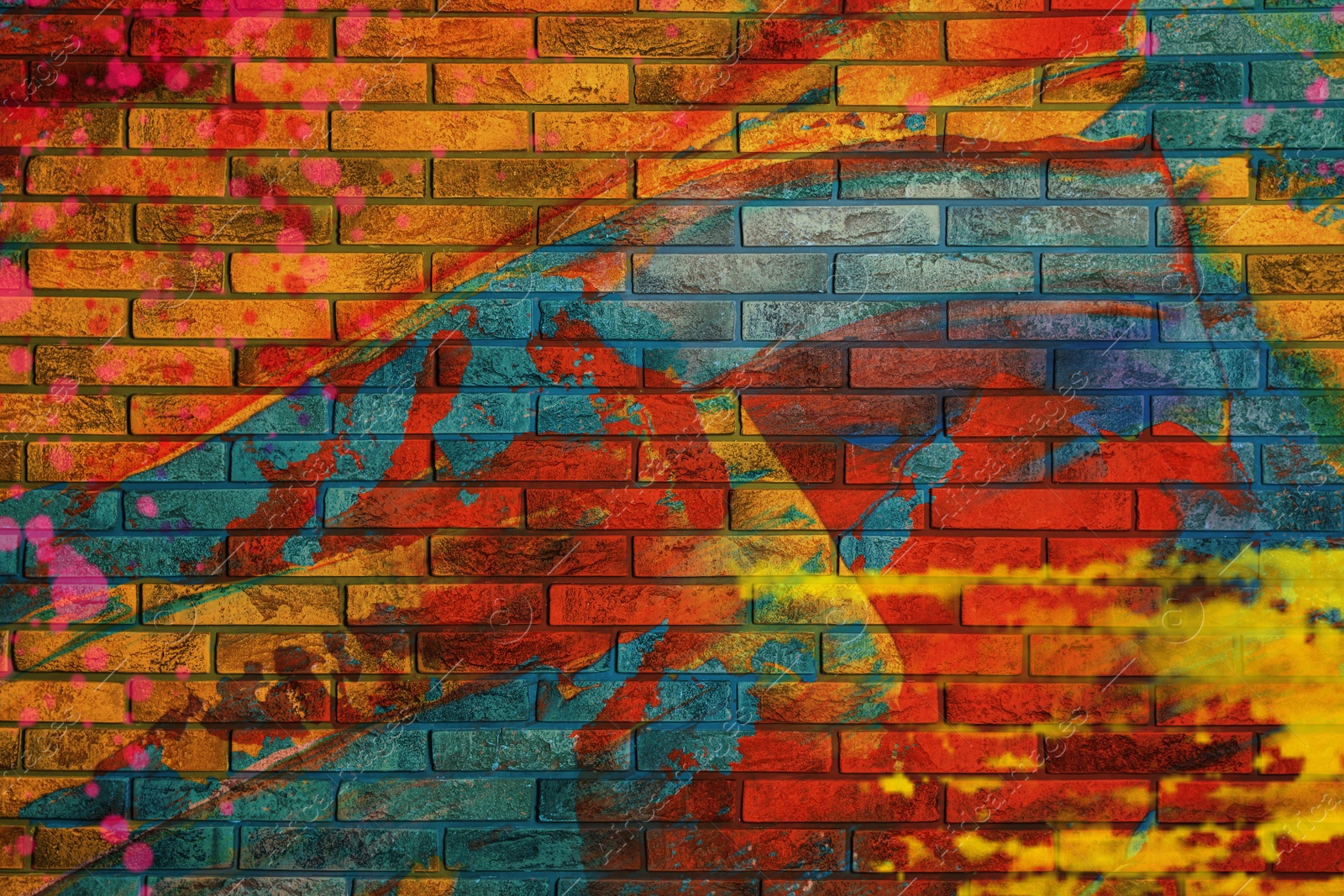 Image of Abstract colorful graffiti drawn on brick wall