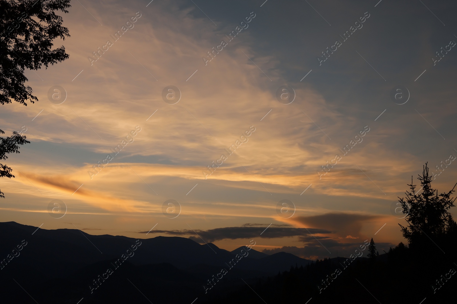 Photo of Picturesque view of mountain landscape and beautiful sunset sky