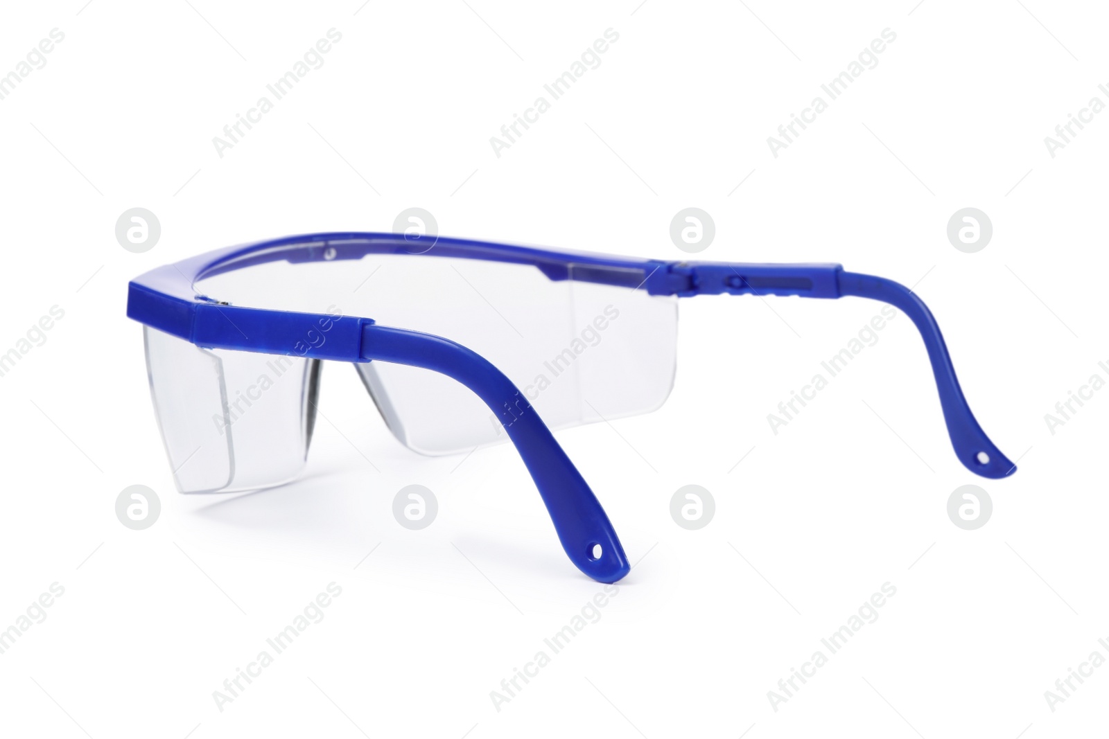 Photo of Protective goggles on white background. Construction tool