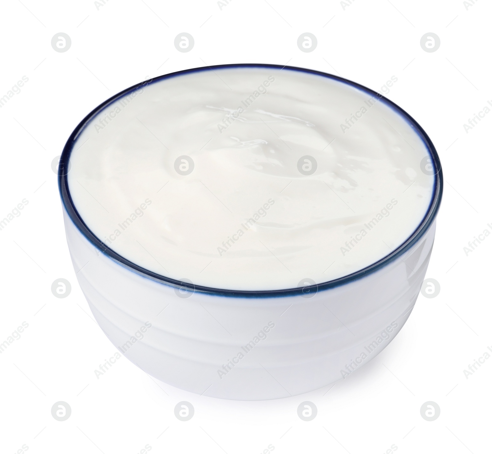 Photo of Bowl with delicious organic yogurt isolated on white