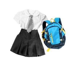 Photo of Stylish school uniform for girl and backpack on white background, top view