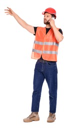 Photo of Man in reflective uniform talking on smartphone against white background