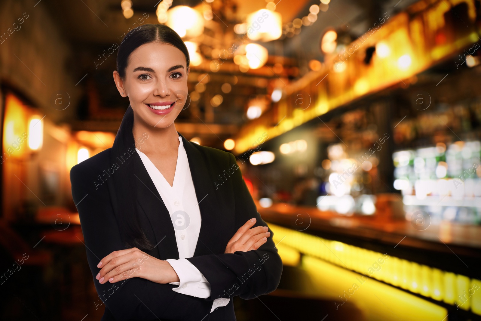 Image of Portrait of hostess wearing uniform in bar. Space for text