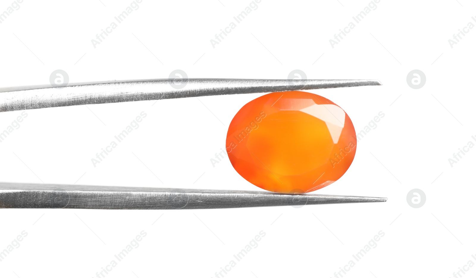 Photo of Tweezers with beautiful gemstone on white background