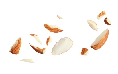 Pieces of tasty almonds on white background