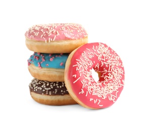 Delicious glazed doughnuts with sprinkles on white background