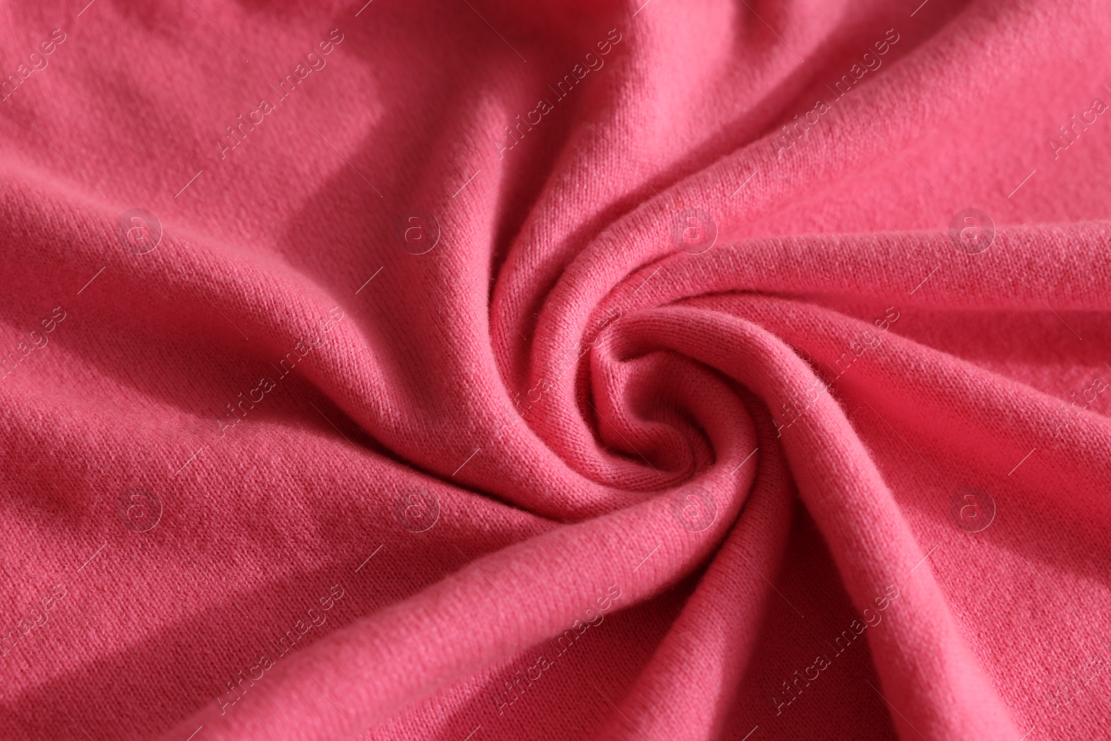 Photo of Beautiful pink fabric as background, closeup view