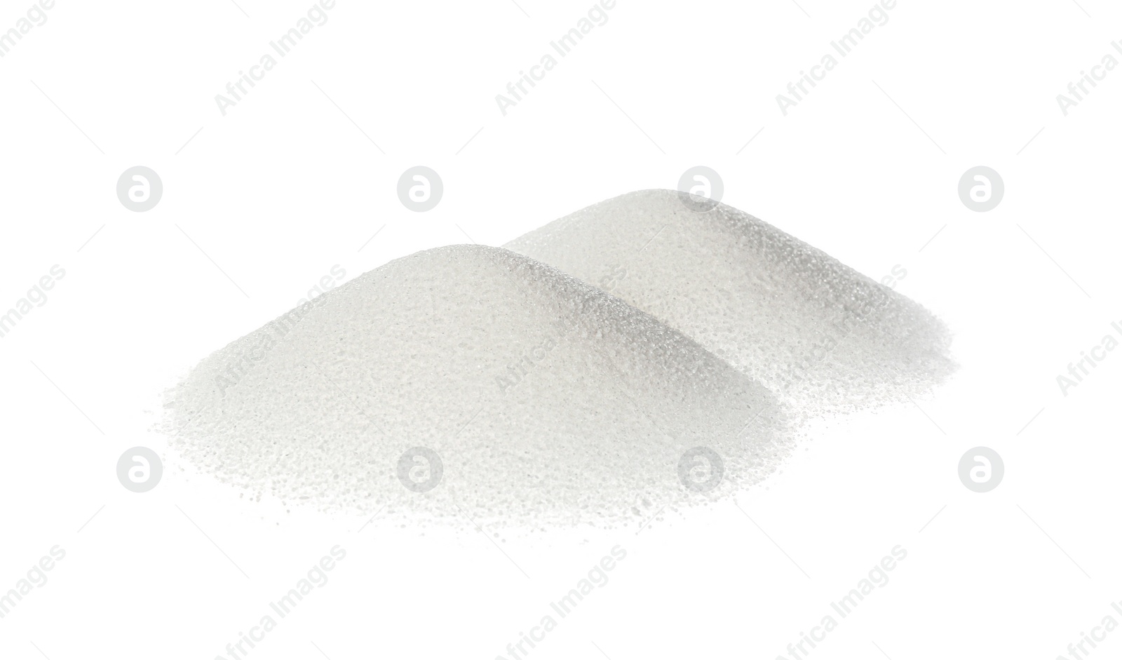 Photo of Piles of natural salt isolated on white