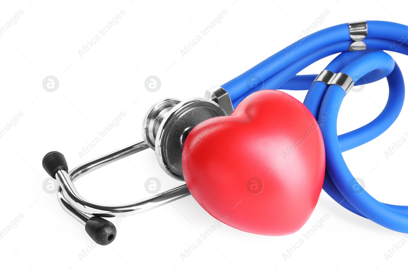 Photo of Stethoscope and red heart isolated on white