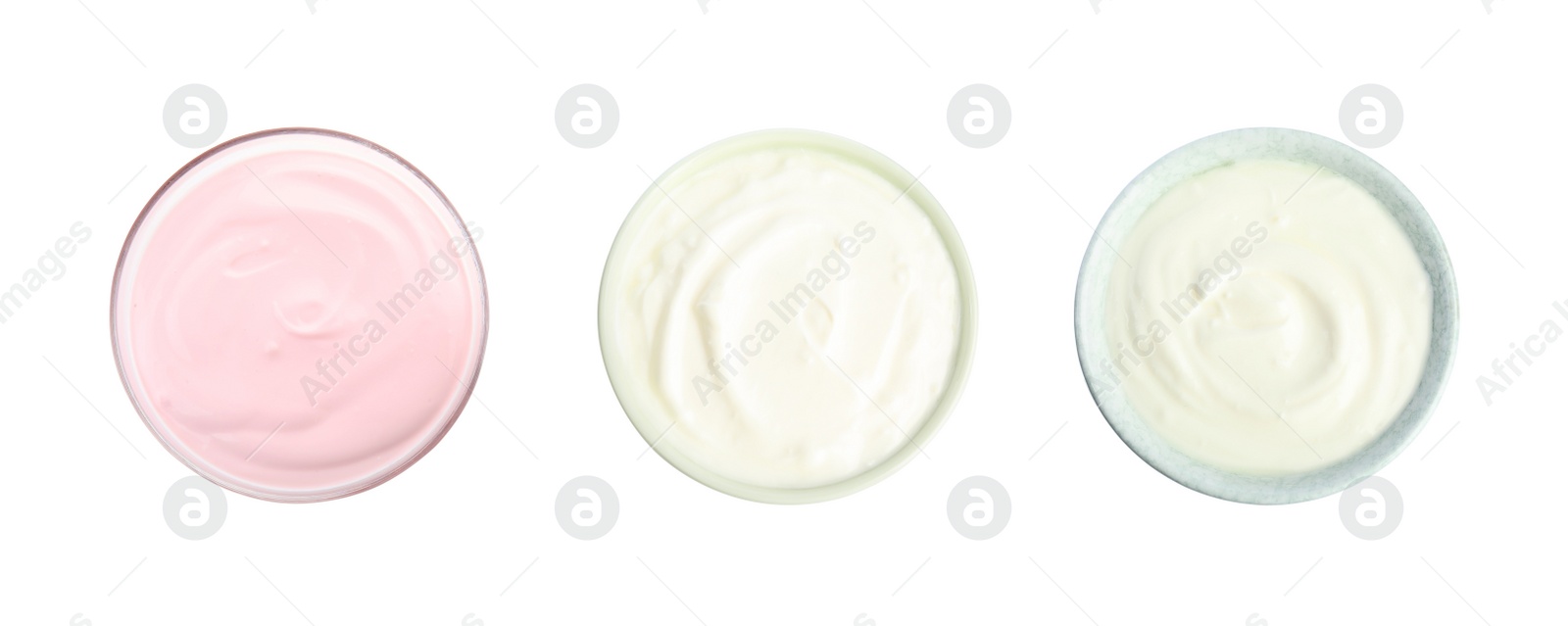 Image of Set of delicious natural yogurts in bowls on white background, top view. Banner design