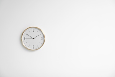 Photo of Stylish clock on white background. Time concept