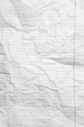 Photo of Sheet of crumpled lined paper as background, top view