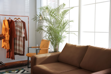 Photo of Modern living room interior with stylish leather sofa