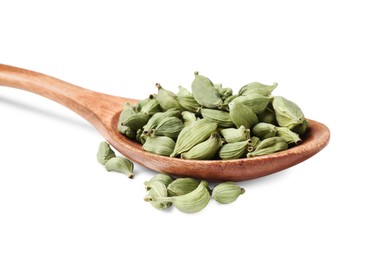 Photo of Wooden spoon with cardamom on white background, closeup