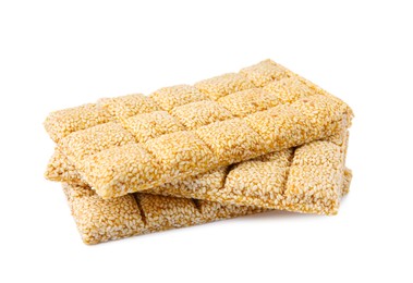 Photo of Tasty sesame kozinaki bars on white background