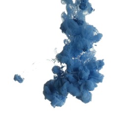 Photo of Splash of blue ink on light background, closeup. Space for text