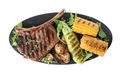 Photo of Delicious beef steak served with vegetables isolated on white, top view