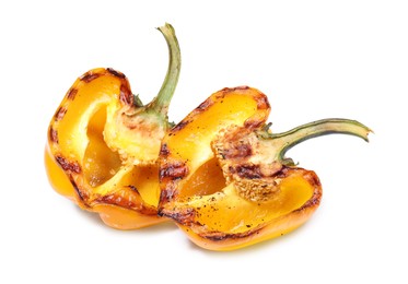 Photo of Halves of grilled yellow bell pepper isolated on white