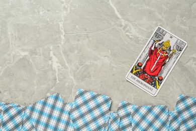 Photo of The Hierophant and other tarot cards on light grey marble table, flat lay. Space for text