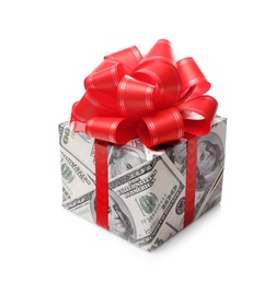 Photo of Gift box wrapped in decorative paper with dollar pattern on white background