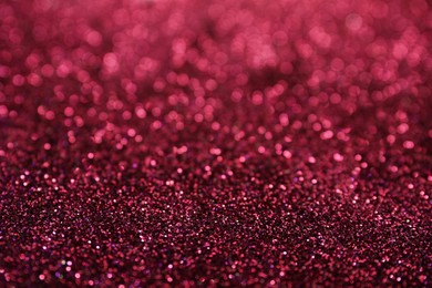 Photo of Shiny pink glitter as background. Bokeh effect