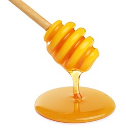 Photo of Honey dripping from dipper on white background