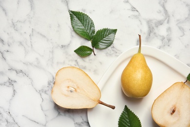 Photo of Flat lay composition with ripe pears on marble background