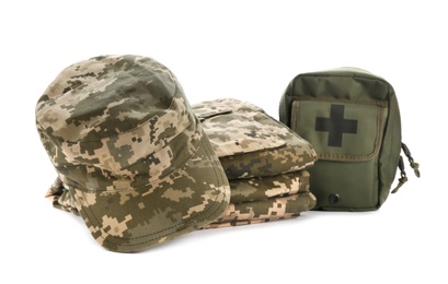 Photo of Military clothes and first-aid kit on white background