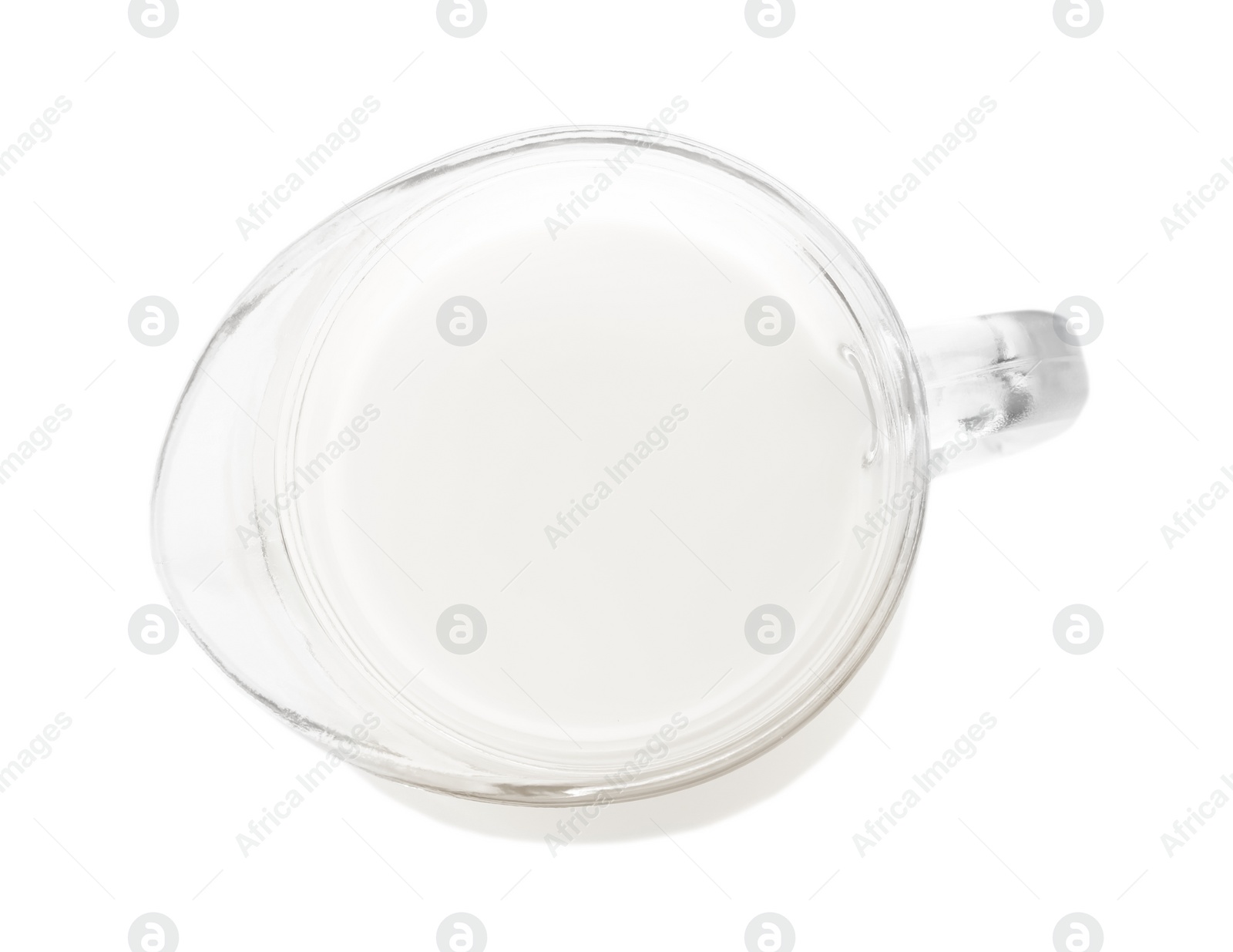 Photo of Jug of fresh milk isolated on white, top view