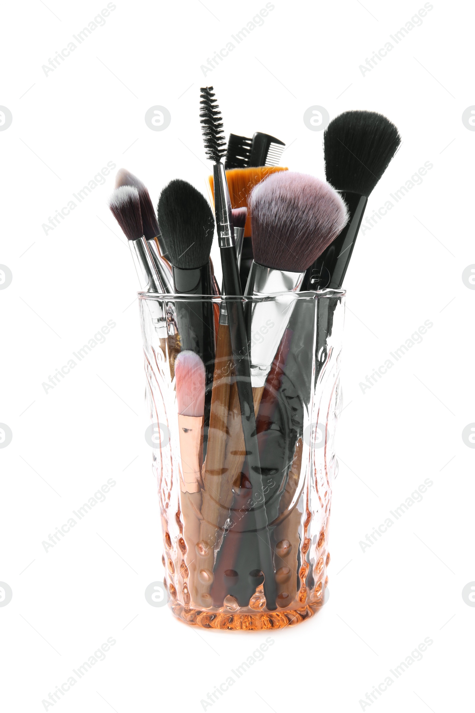 Photo of Holder with makeup brushes of professional artist on white background