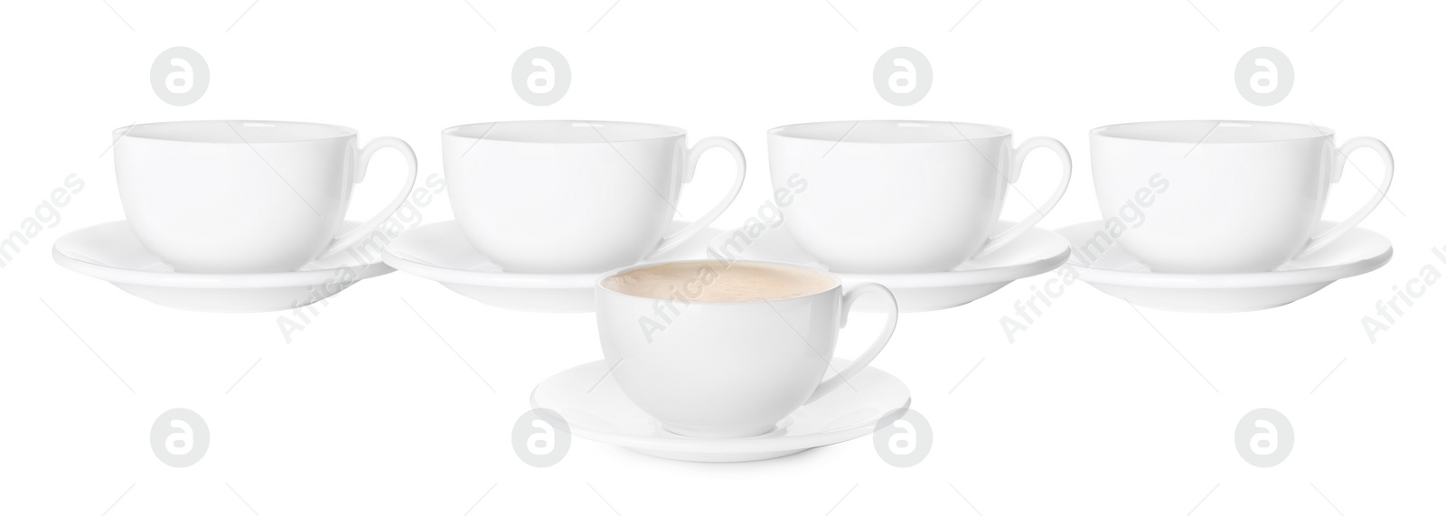 Image of Empty ceramic cups and one with aromatic coffee on white background. Banner design