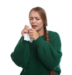 Young woman suffering from cold on white background