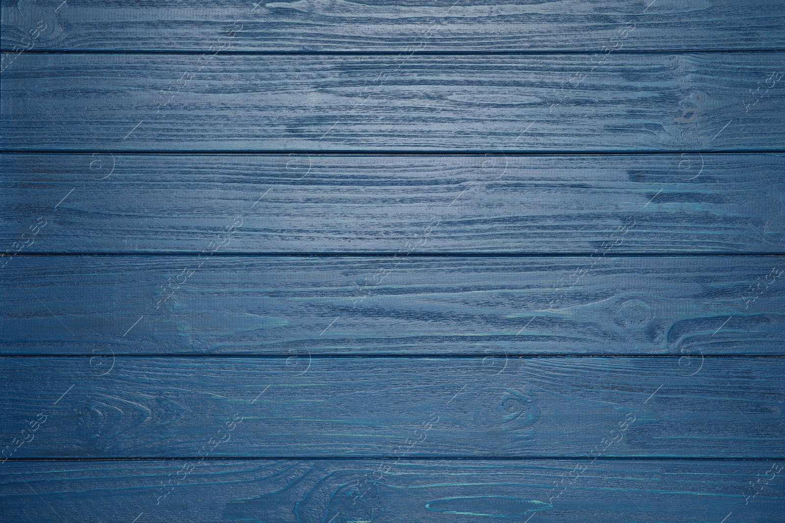 Photo of Texture of blue wooden surface as background, top view