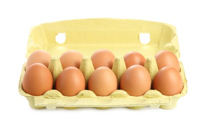 Photo of Chicken eggs in carton isolated on white