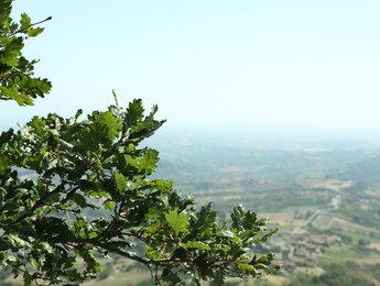 Photo of Picturesque view on city of San Marino on sunny day, space for text