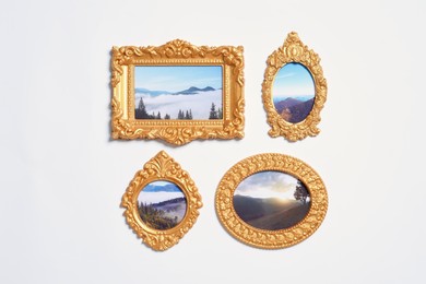 Photo of Vintage frames with photos of beautiful landscapes hanging on white wall