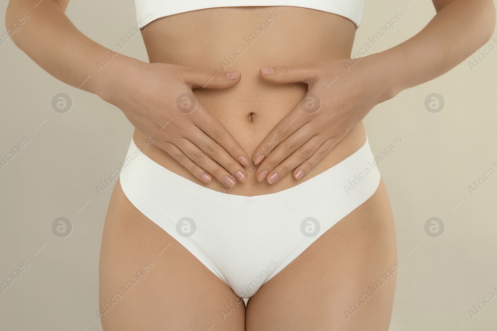 Photo of Gynecology. Woman in underwear on light background, closeup