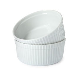 Photo of New ceramic bowls on white background. Tableware