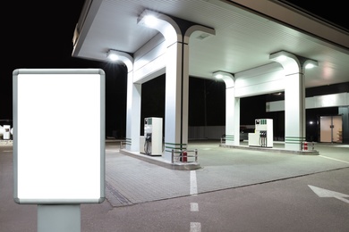 Image of Empty billboard on modern gas station outdoors, space for design