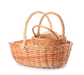 Three decorative wicker baskets on white background