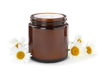 Photo of Jar of hand cream and chamomiles on white background