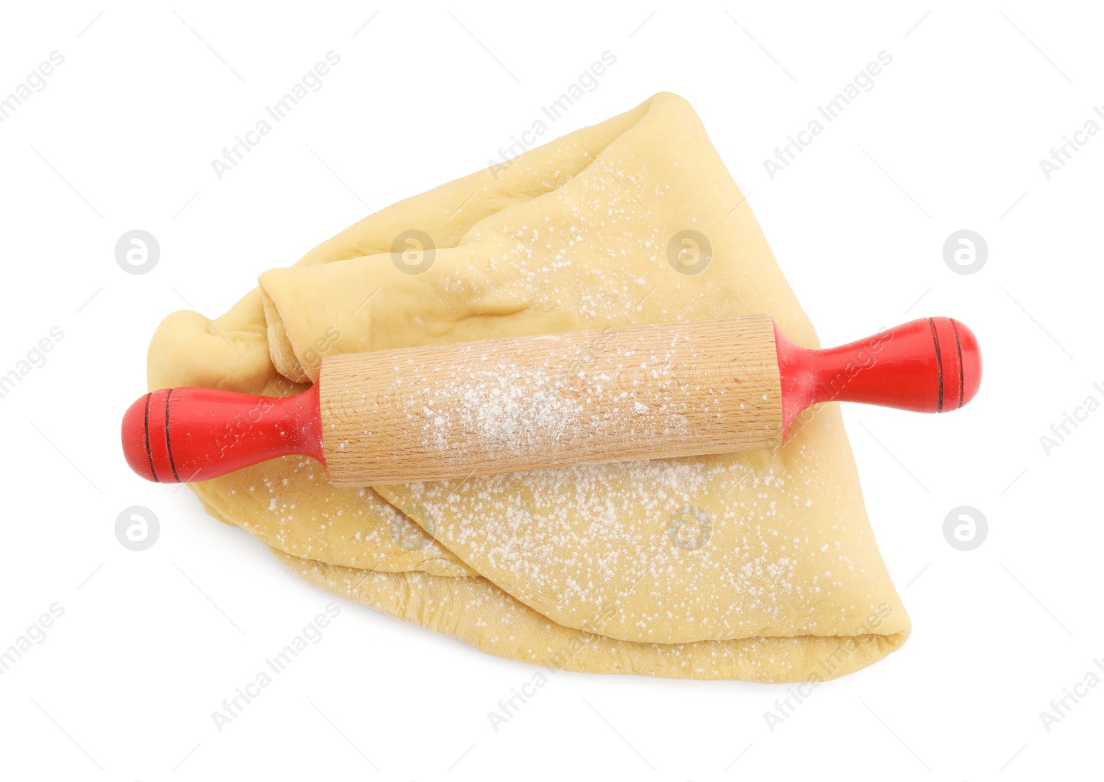 Photo of Raw dough and rolling pin isolated on white, top view