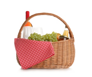 Photo of Picnic basket with wine and food isolated on white