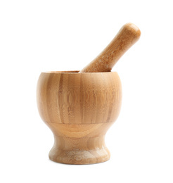 Photo of Wooden mortar and pestle isolated on white. Cooking utensils
