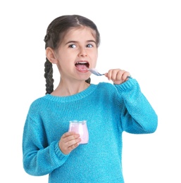 Little girl with yogurt on white background