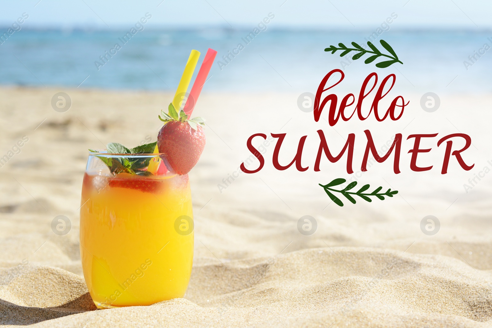 Image of Hello Summer. Glass of cocktail with strawberry on sandy beach near sea