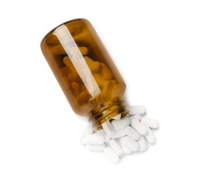 Photo of Bottle with vitamin capsules isolated on white, top view